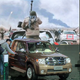 Image for article titled Chinese Use Libyan Uprising To Advertise 'Stronger Than War' Trucks